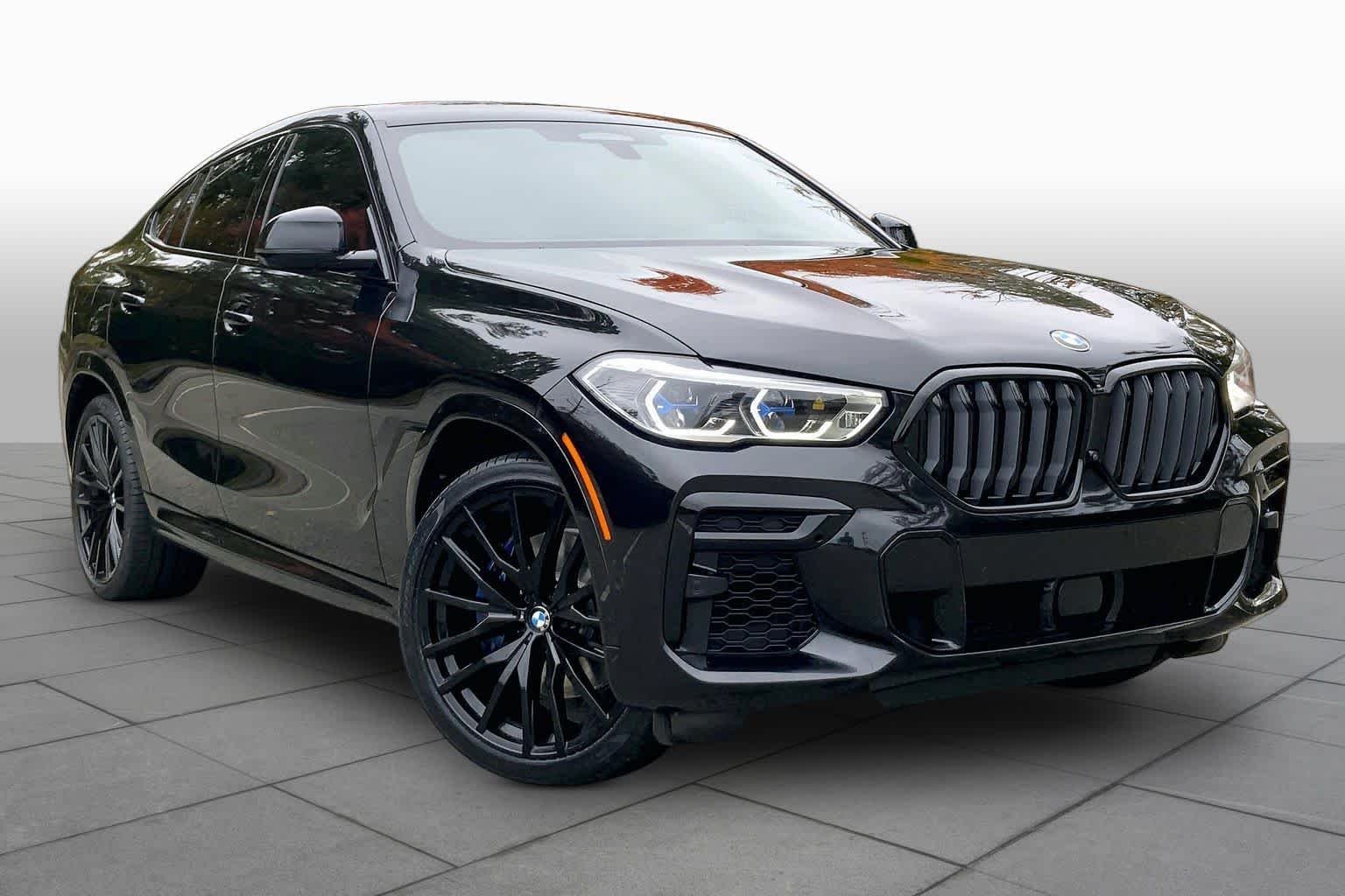 Used 2023 Black Sapphire Metallic BMW xDrive40i image 2