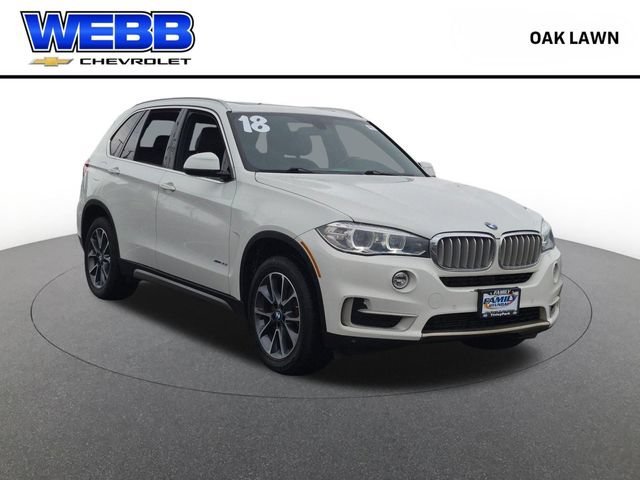 Used 2019 Black BMW M550i xDrive image 1