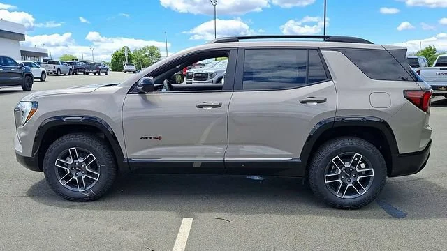 New 2026 Riverstone Metallic GMC AT4 image 7