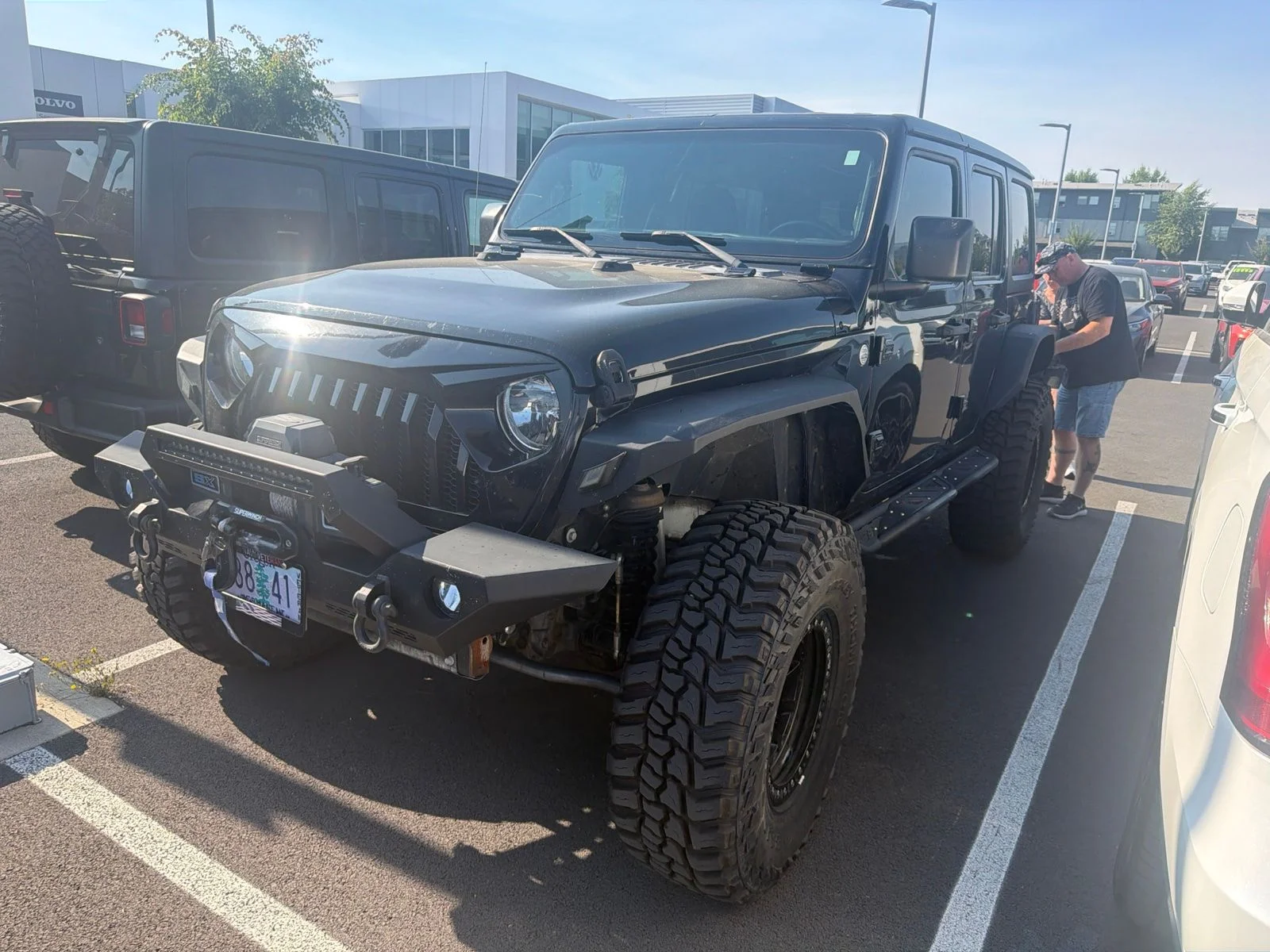 Used 2018 Black Jeep Unlimited Sport image 1