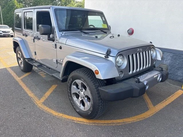Used 2017 Billet Silver Metallic Clearcoat Jeep Sahara image 1