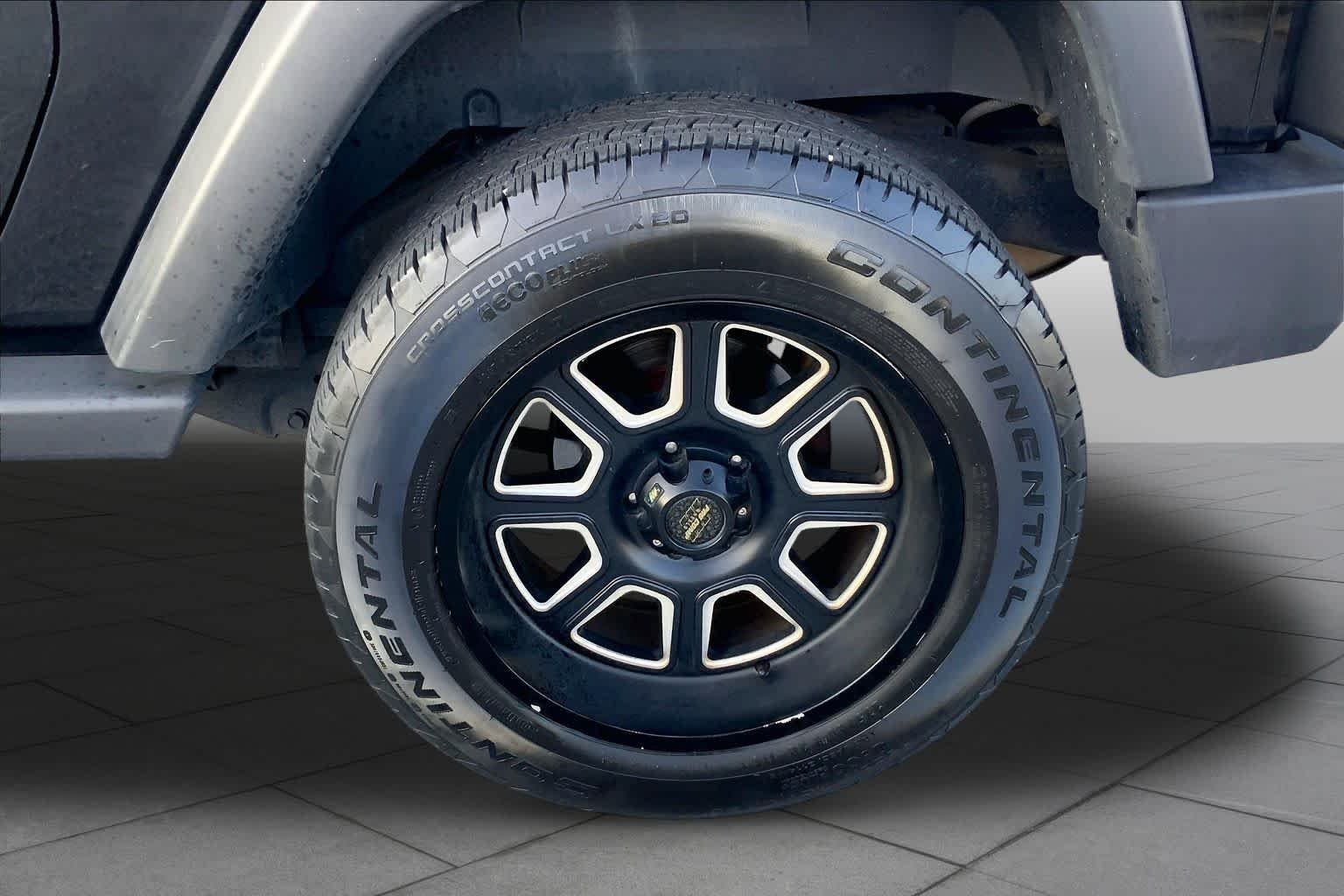 Used 2010 Black Jeep Sport image 9