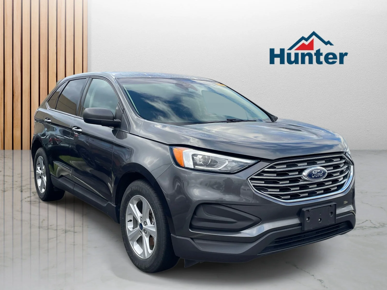 Used 2020 Magnetic Metallic Ford SE image 1
