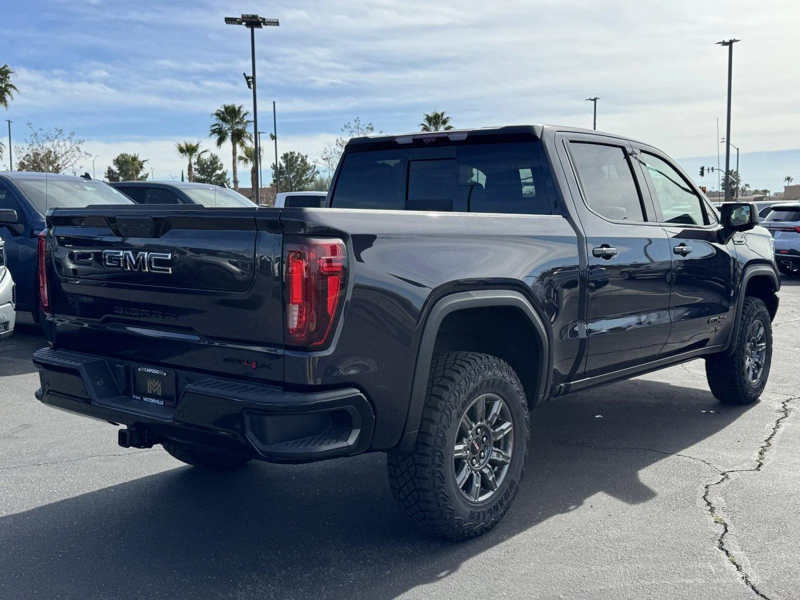 New 2026 TITANIUM RUSH METALLIC GMC AT4X image 6