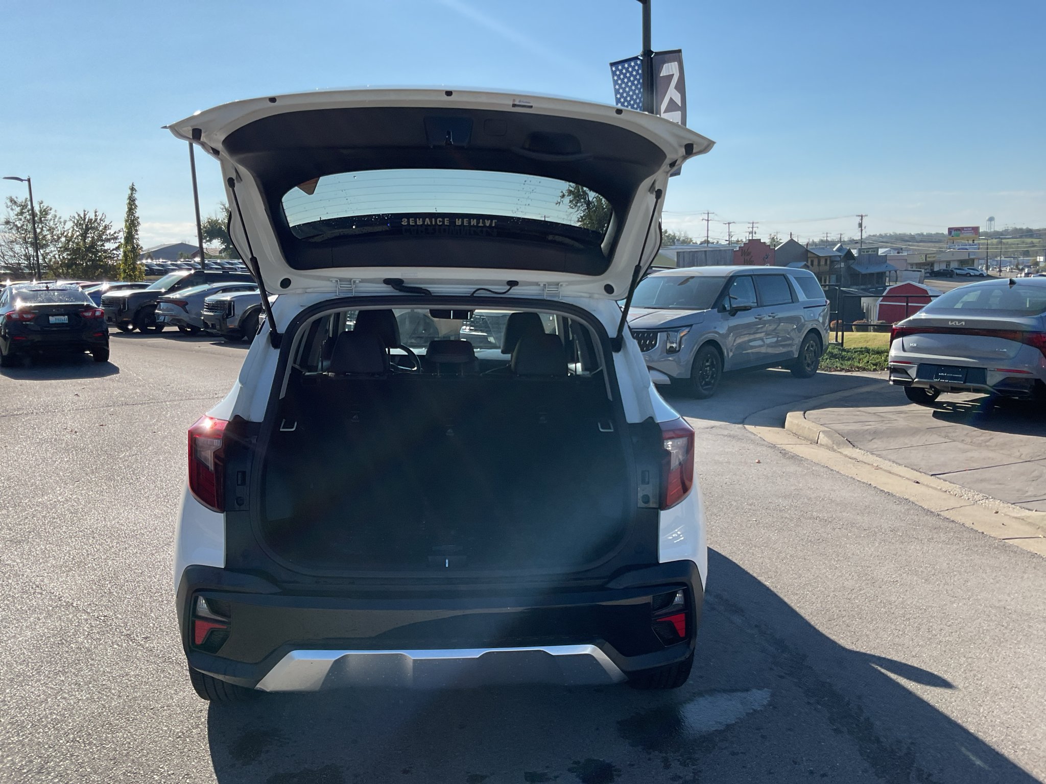 Used 2025 Clear White/Black Roof Kia S image 15