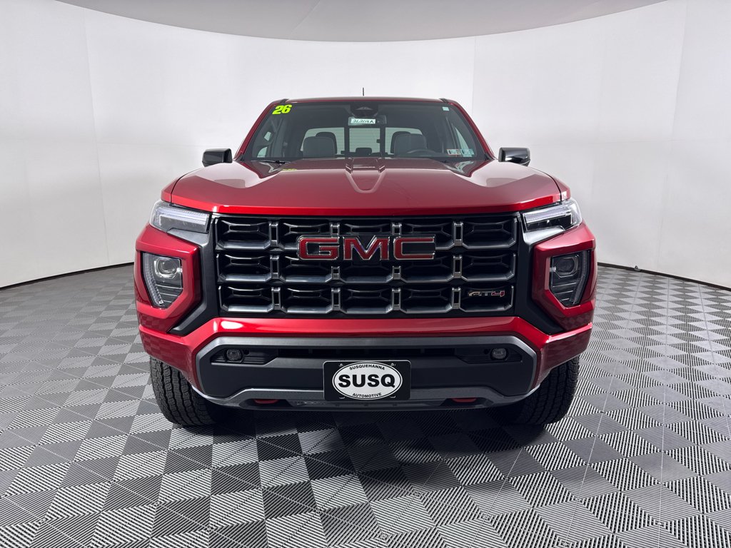 Used 2026 Volcanic Red Tintcoat GMC 4WD AT4 image 2