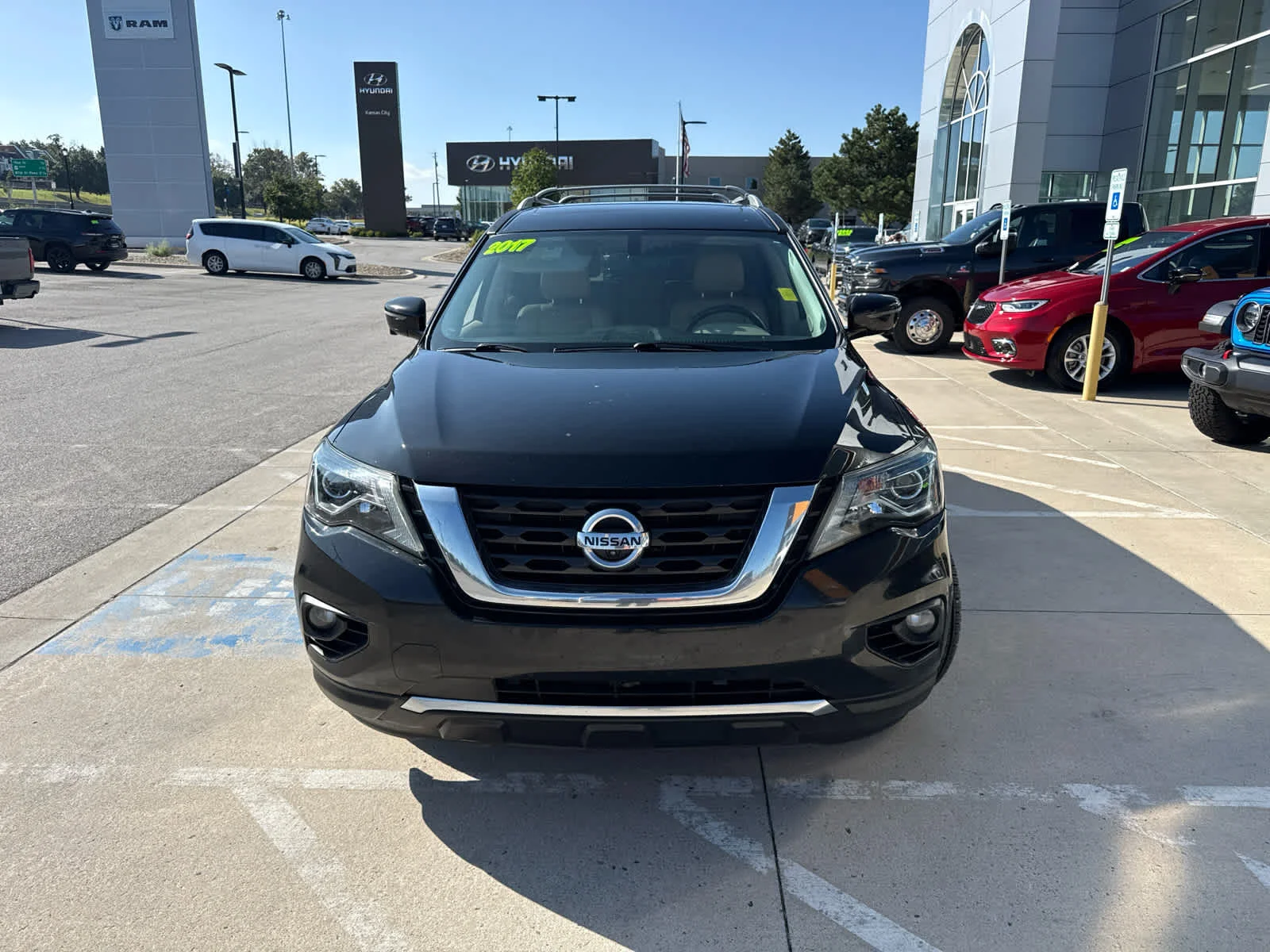 Used 2017 Magnetic Black Metallic Nissan Platinum image 2