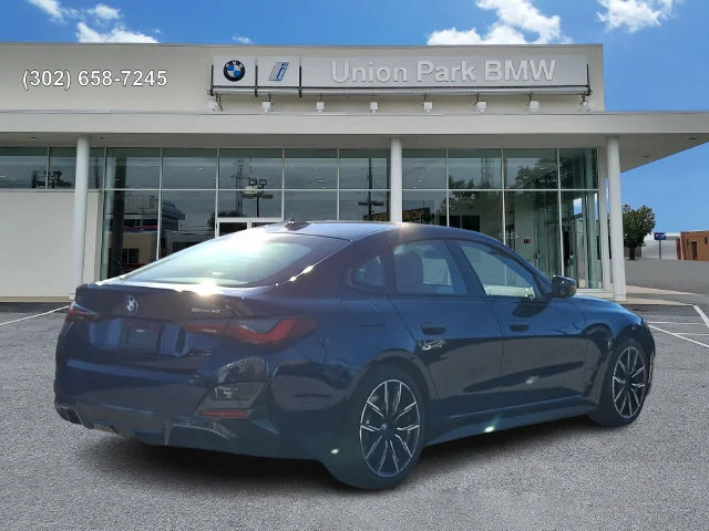 Certified Used 2022 Tanzanite Blue II Metallic BMW eDrive40 image 4