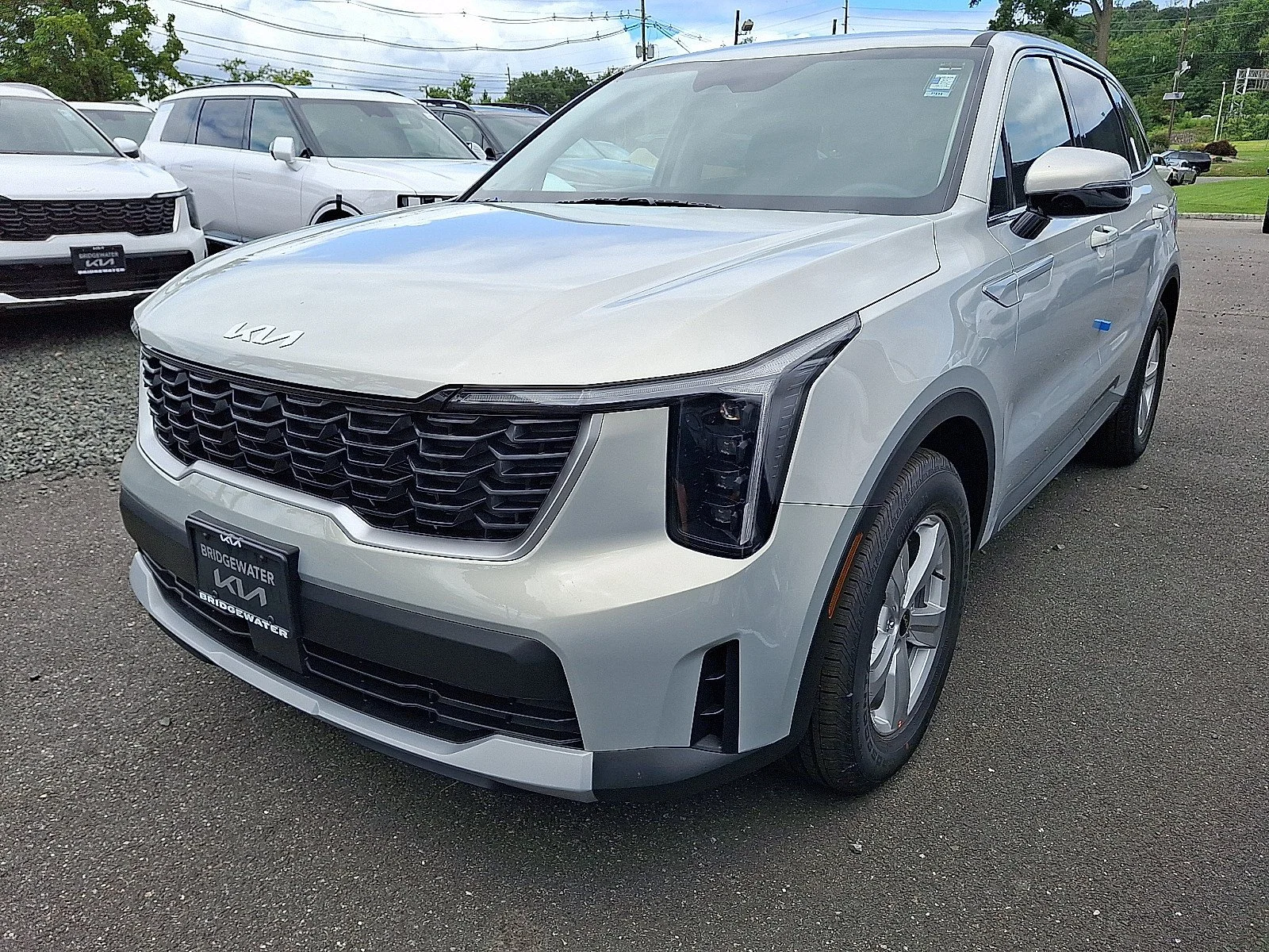 New 2026 Ivory Silver Kia LX image 3