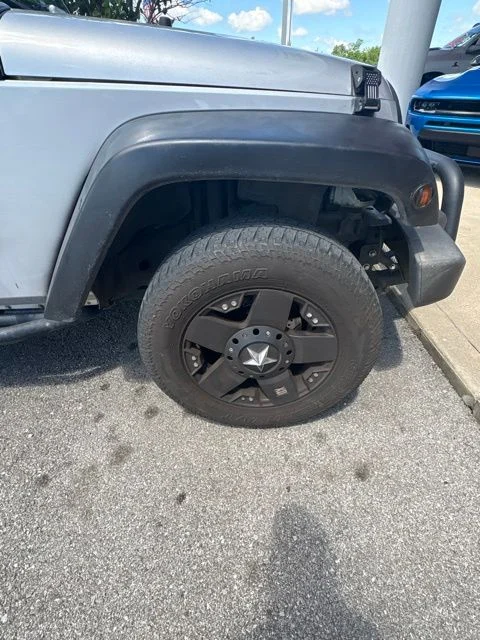 Used 2010 Silver Jeep Sport image 4