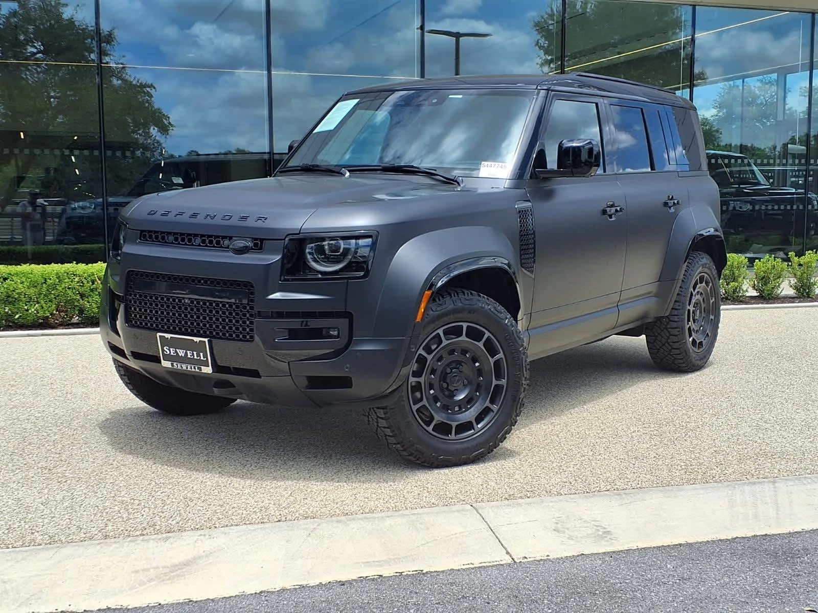 Certified Pre-Owned 2026 Land Rover Defender OCTA Black Sport