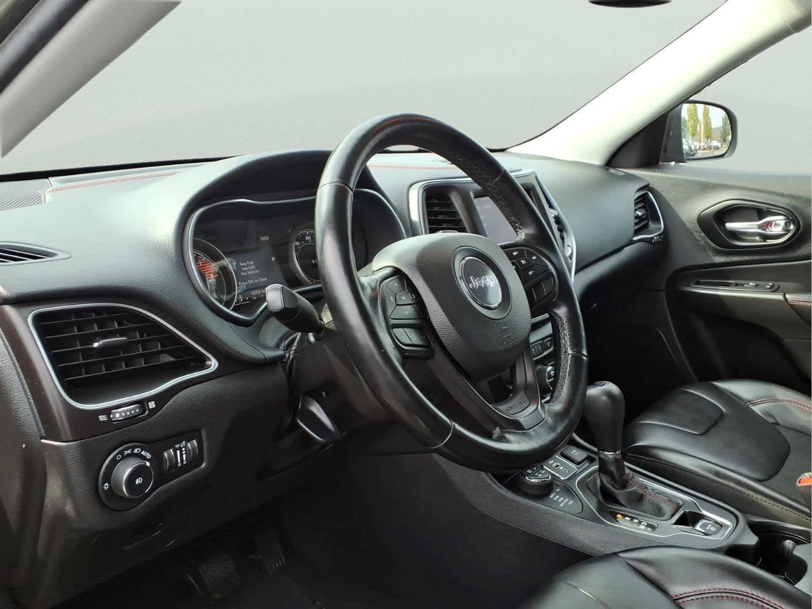 Used 2021 Olive Green Pearlcoat Jeep Trailhawk image 14