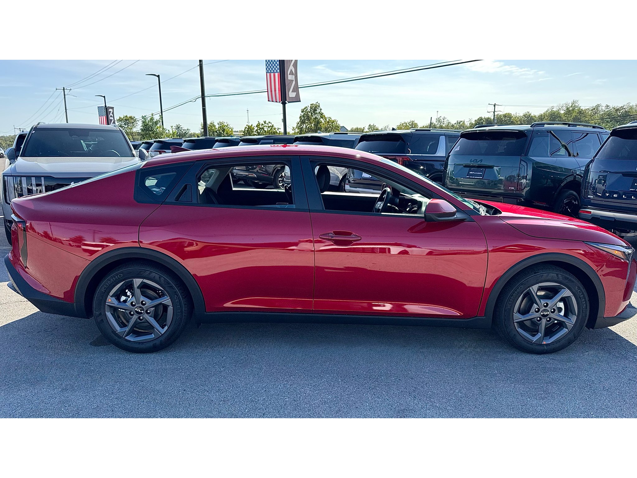 New 2026 Currant Red Kia LXS image 3