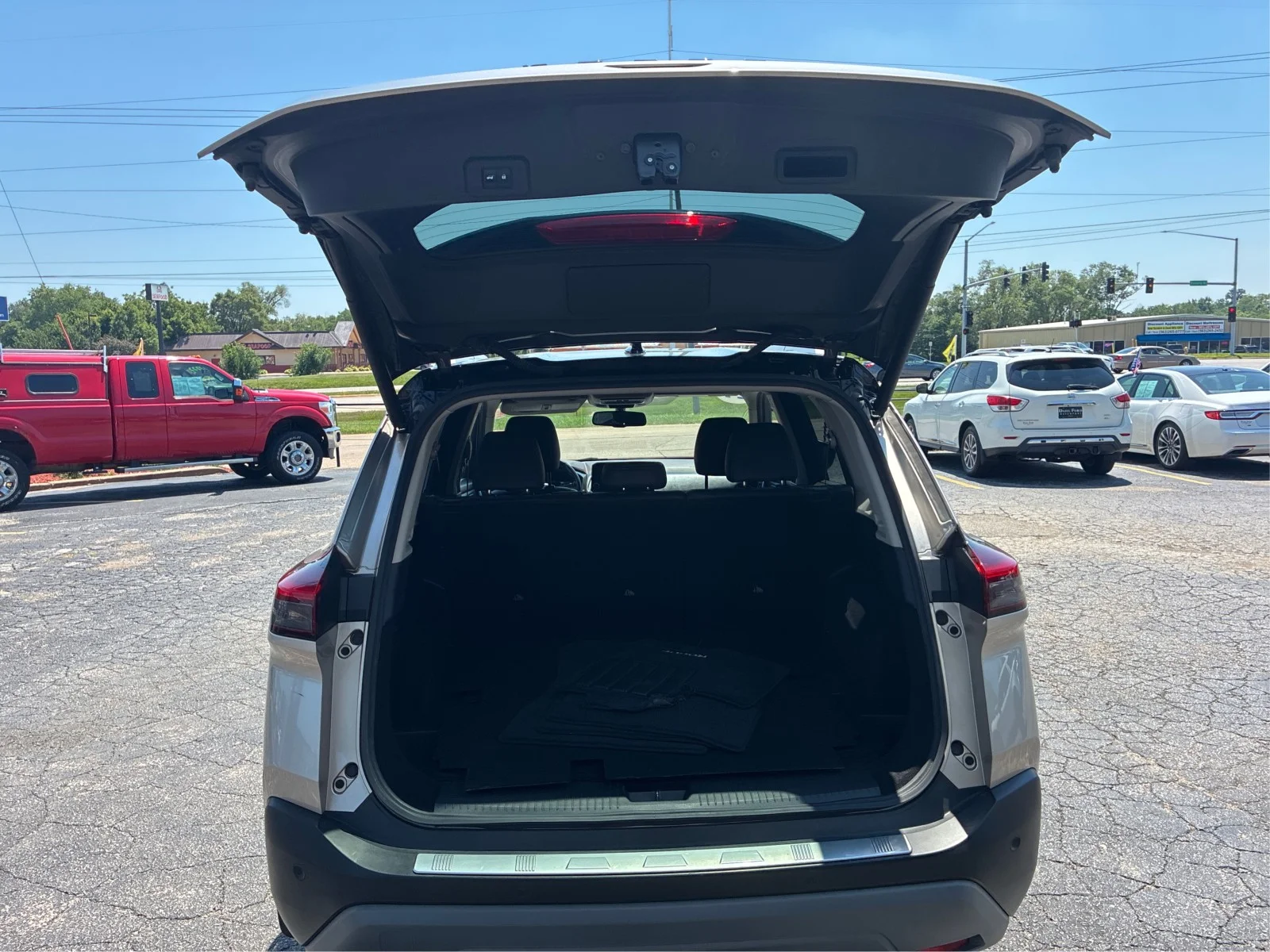 Used 2021 Brilliant Silver / Black Nissan SL image 12