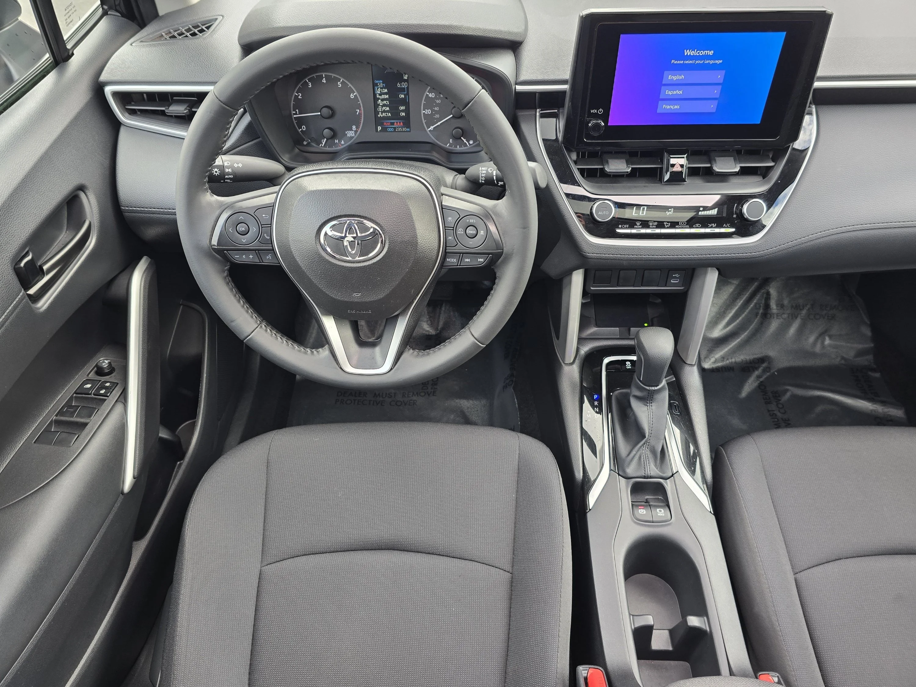 Used 2024 Jet Black Toyota LE image 4