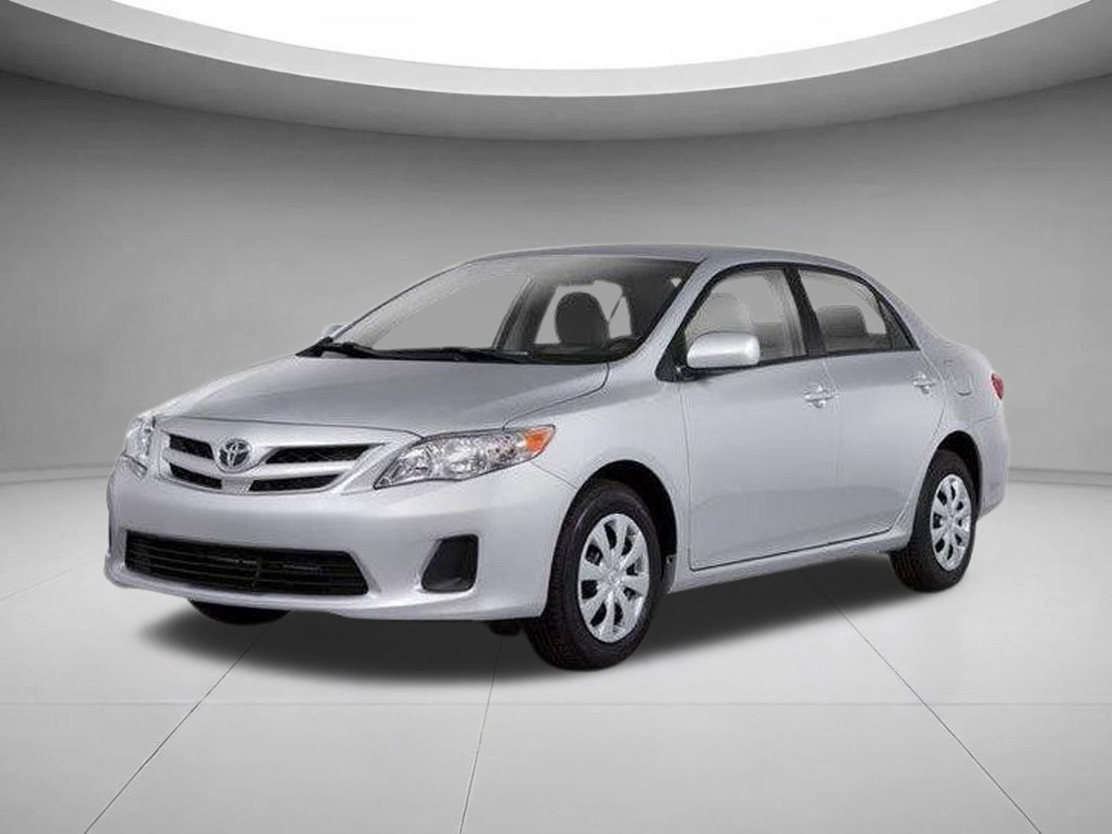 Used 2011 Barcelona Red Metallic Toyota LE image 1