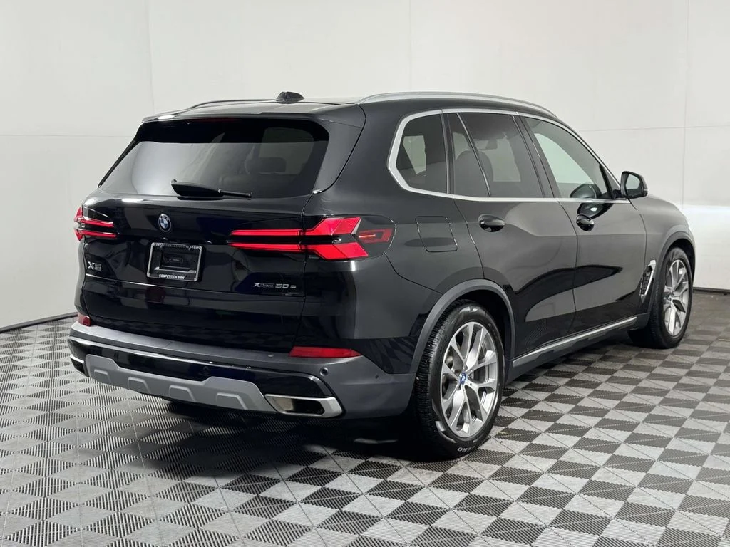 Certified Used 2024 Black BMW xDrive50e image 10