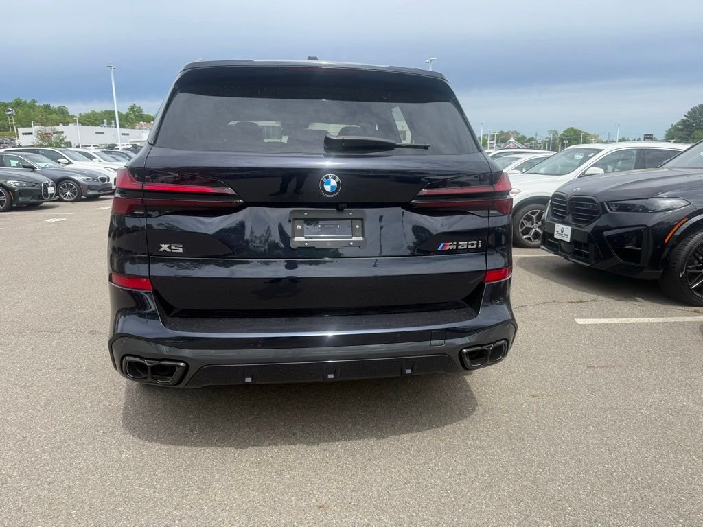 New 2026 Carbon Black Metallic BMW M60i image 4