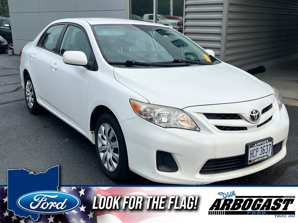 Used 2012 White Toyota LE image 1