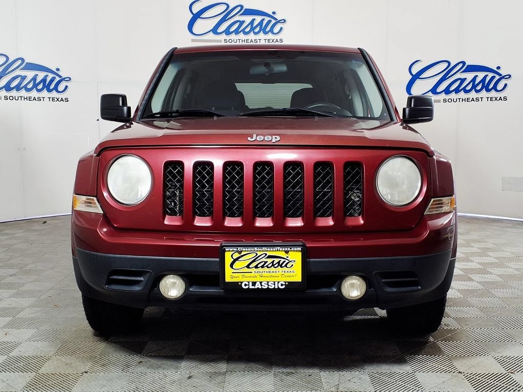 Used 2011 Deep Cherry Red Jeep Sport image 3