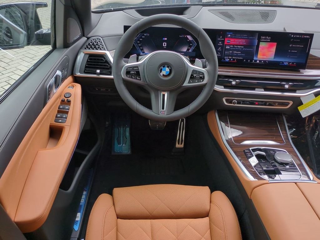 New 2026 Black Sapphire Metallic BMW M60i image 16
