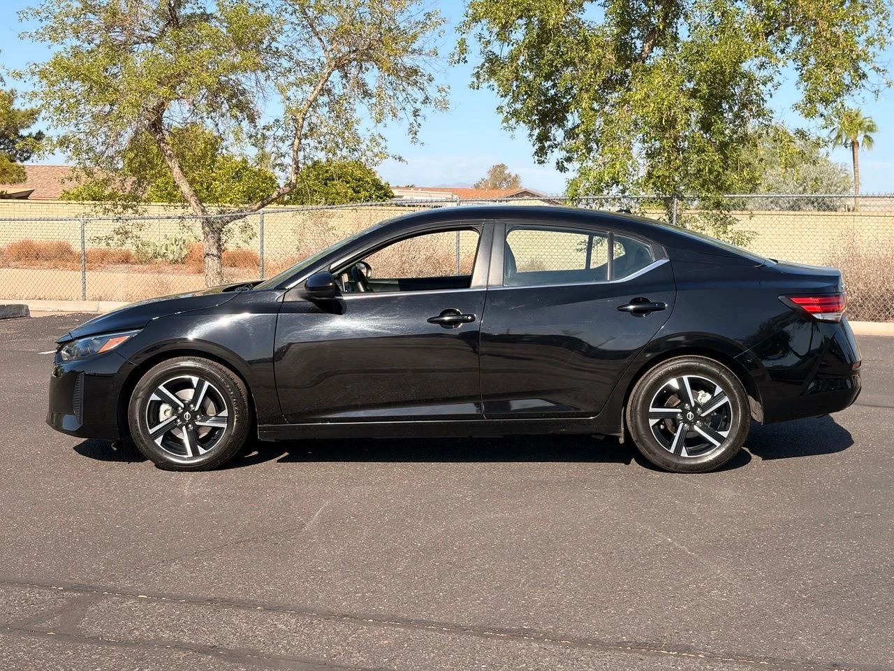 Used 2024 Super Black Nissan SV image 2