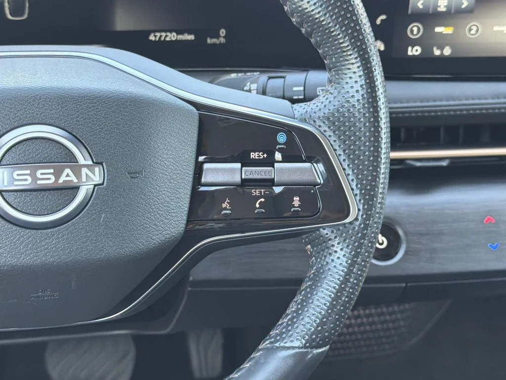 Used 2024 Black Diamond Pearl Nissan EVOLVE+ image 12