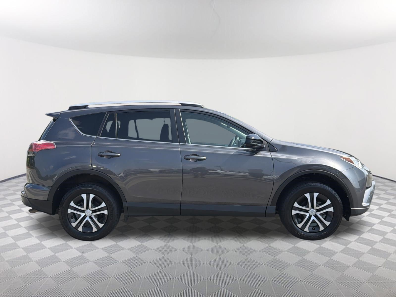 Used 2016 Magnetic Gray Metallic Toyota LE image 16