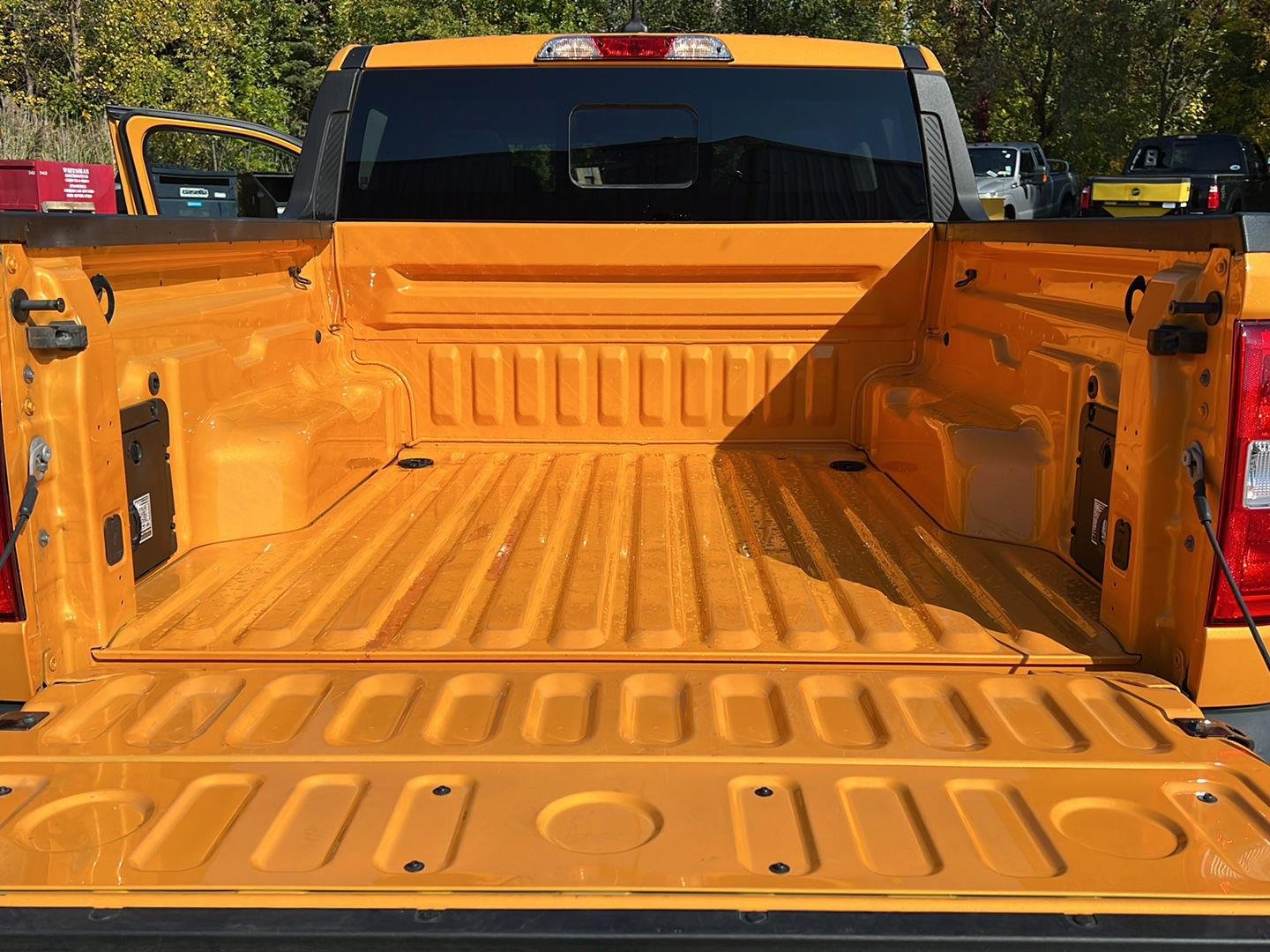 Used 2023 Cyber Orange Metallic Tri-Coat Ford LARIAT image 23