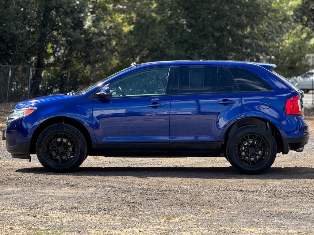 Used 2014 Blue Metallic Ford SEL image 4