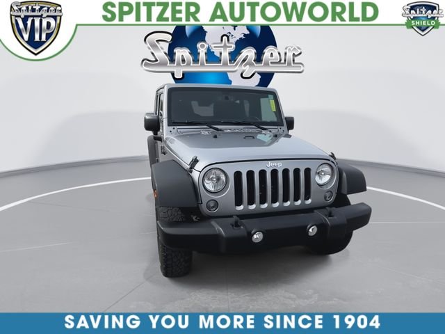 Used 2015 Silver Jeep Unlimited Sport image 3
