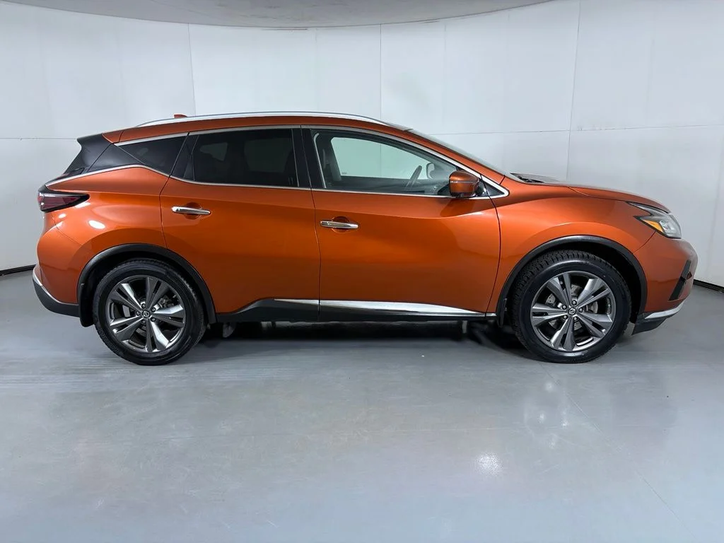 Used 2019 Orange Nissan Platinum image 9