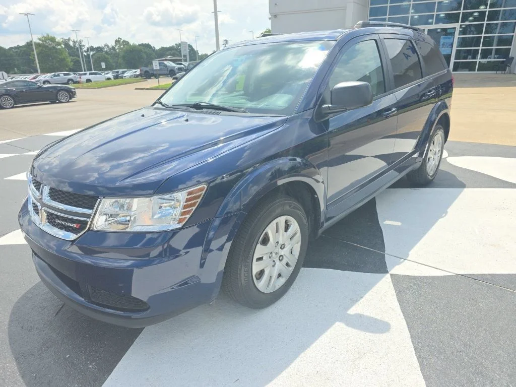 Used 2017 Contusion Blue Pearlcoat Dodge SE image 1