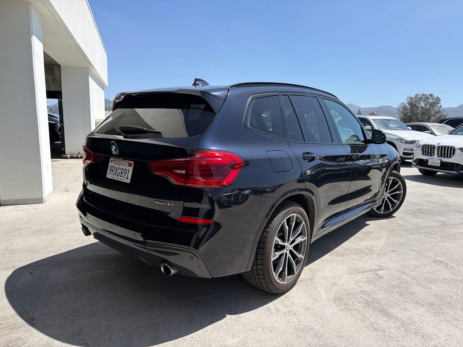 Used 2021 Carbon Black Metallic BMW sDrive30i image 4