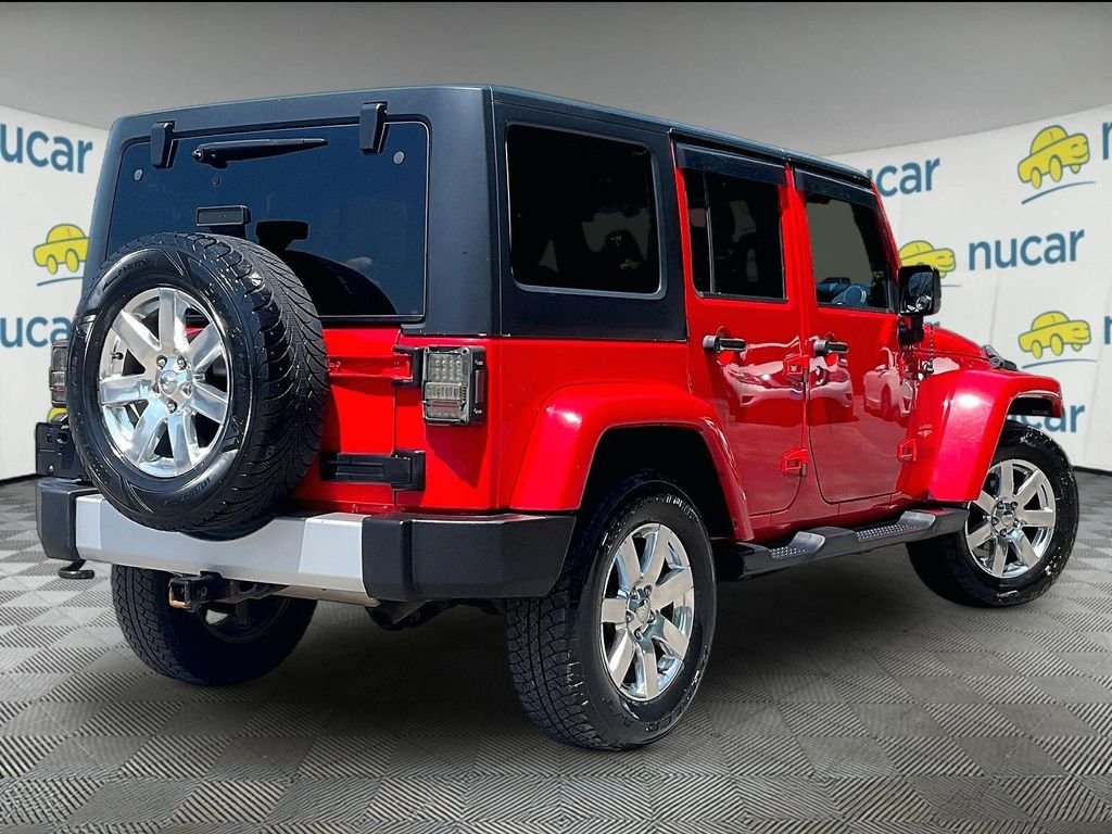 Used 2015 Red Jeep Unlimited Sahara image 6