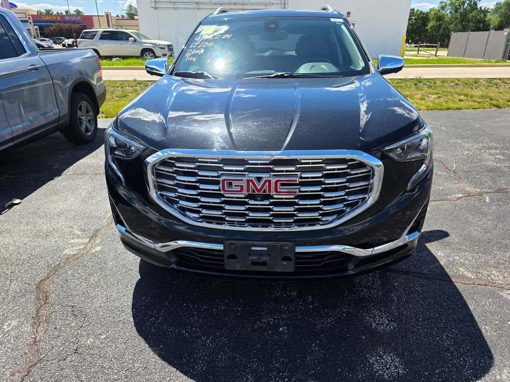Used 2019 Ebony Twilight Metallic GMC Denali image 1
