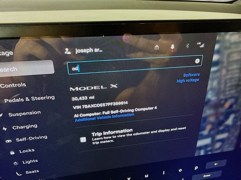 Used 2023 Solid Black Tesla  image 33