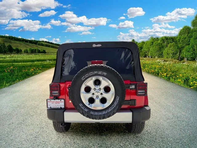 Used 2015 Red Jeep Unlimited Sahara image 5