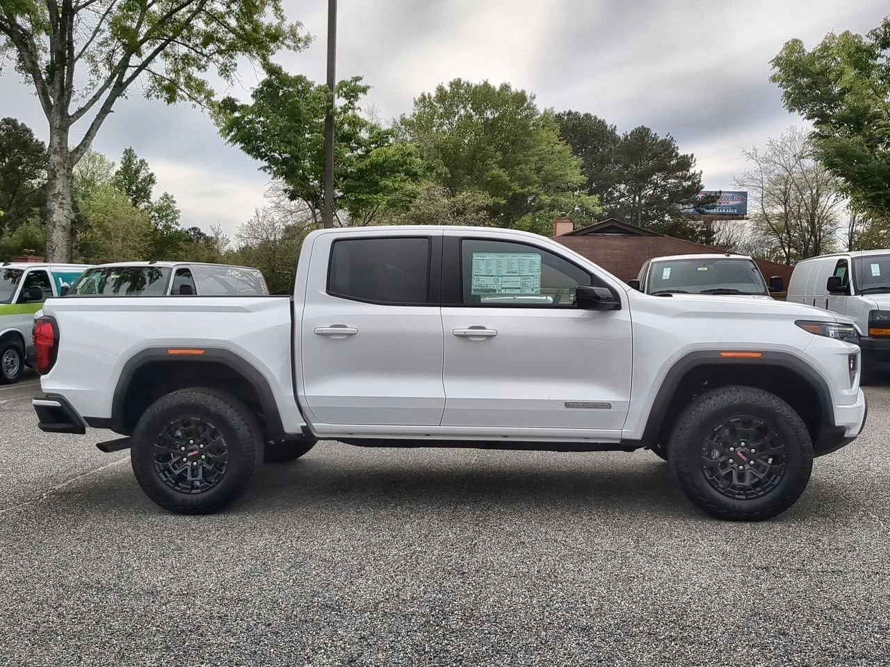 New 2026 Summit White GMC Elevation image 9