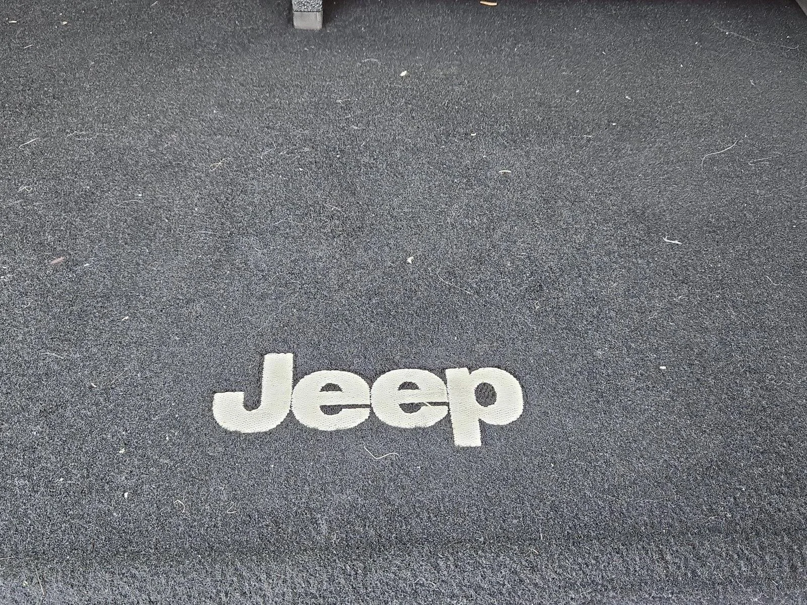 Used 2015 Billet Silver Metallic Clearcoat Jeep Sport image 13
