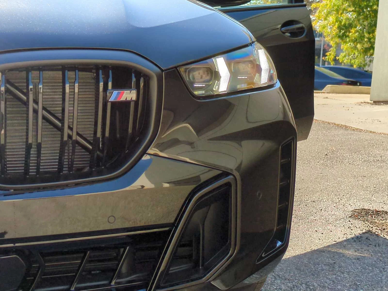 New 2026 Black Sapphire Metallic BMW M60i image 11