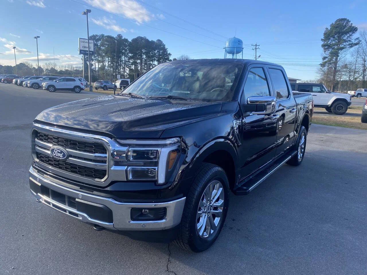 New 2026 Agate Black Ford Lariat 4x4 4dr SuperCrew 5.5 ft. SB image 1