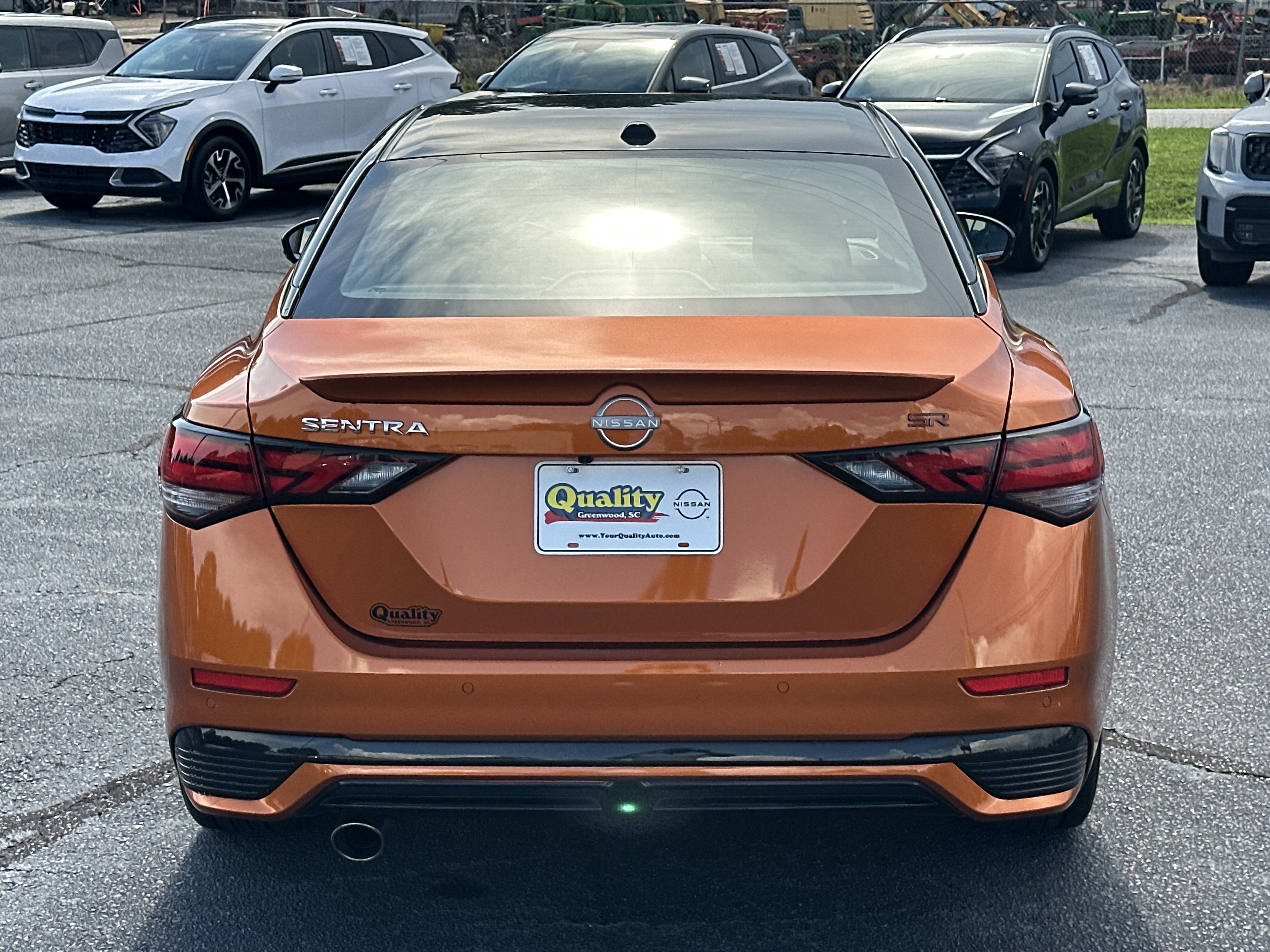 Used 2024 Monarch Orange Metallic/Super Black Nissan SR image 6