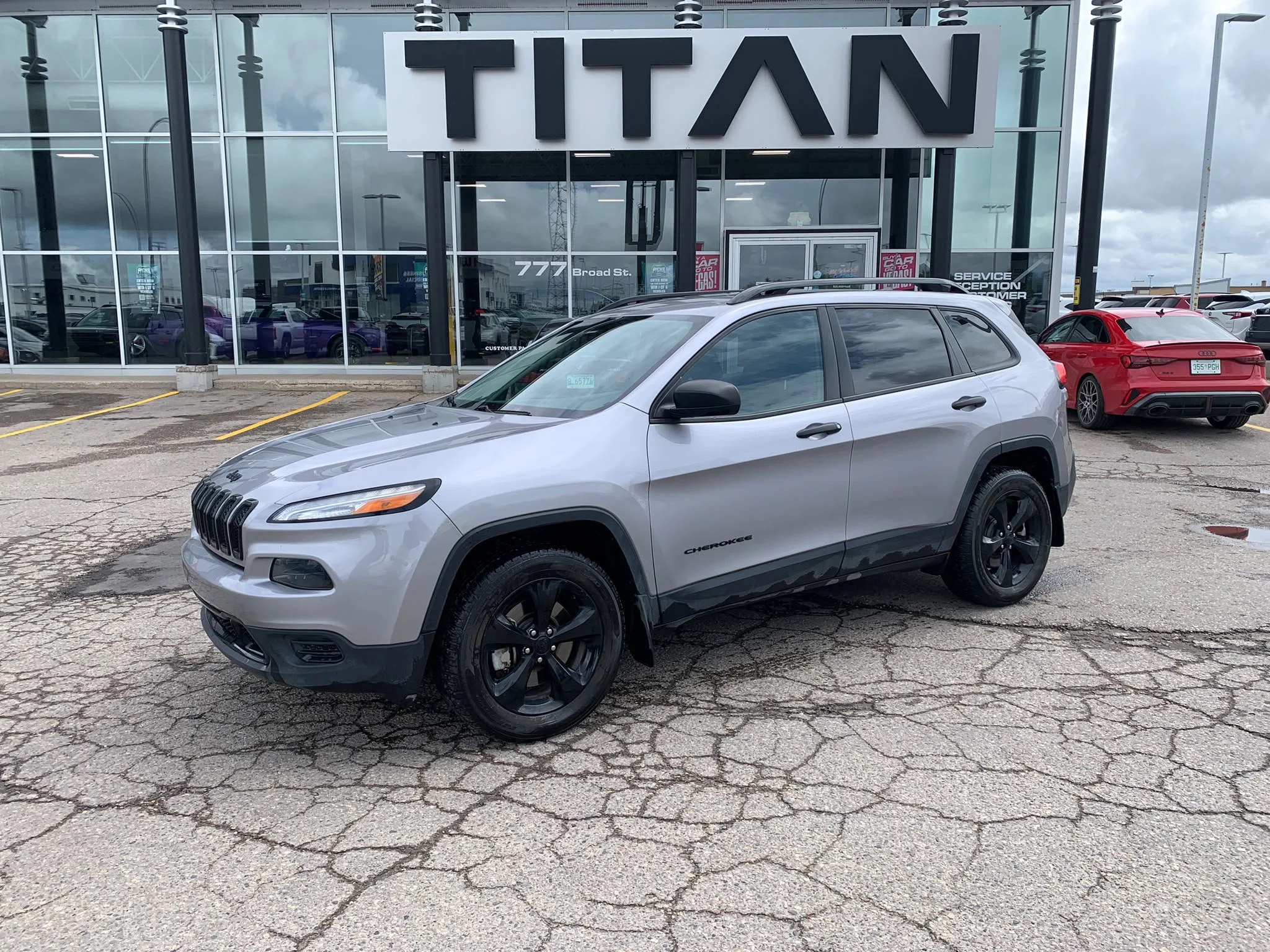 Certified Used 2018 Gray Jeep Sport image 2