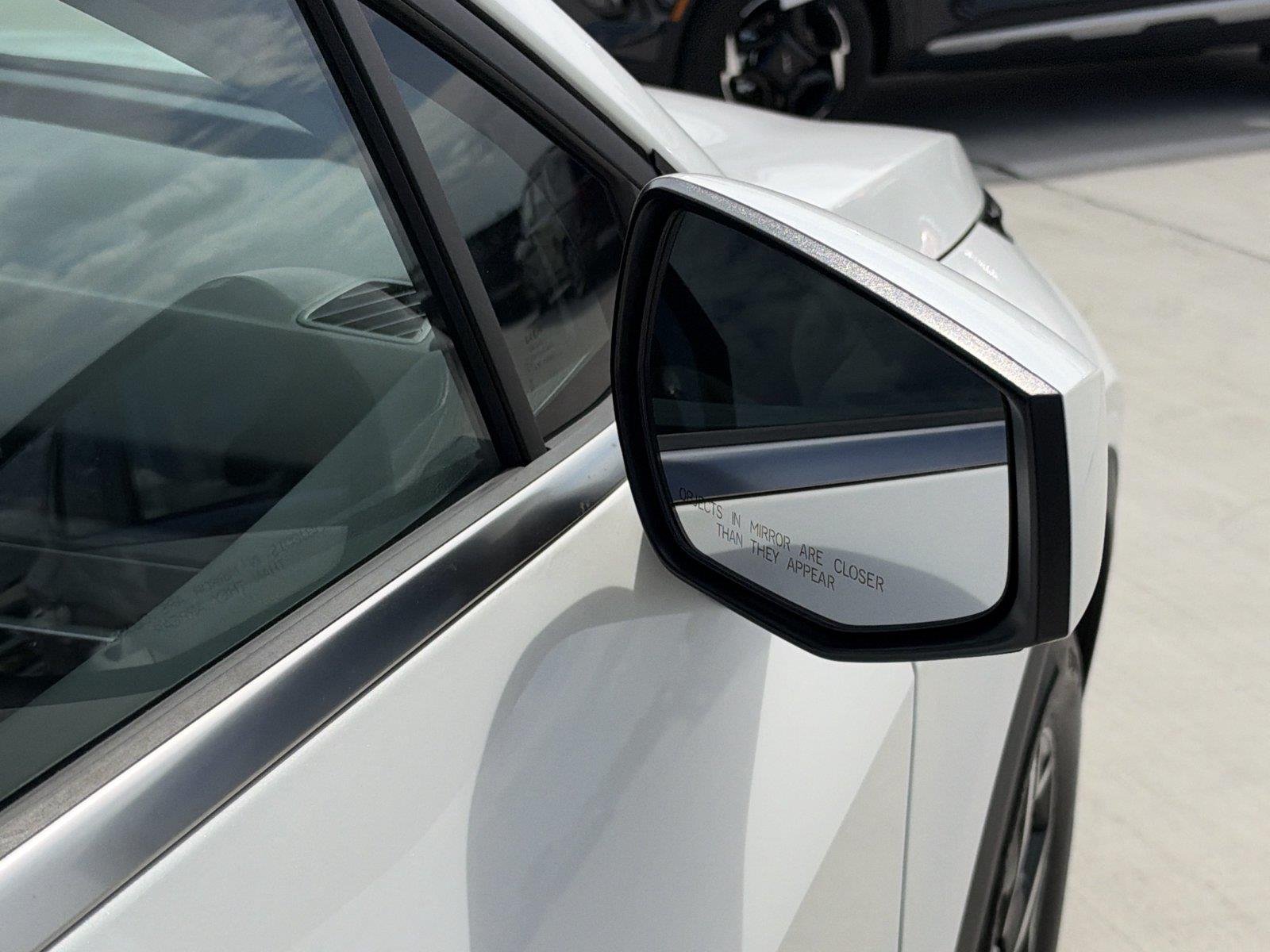 Certified Used 2025 Snow White Pearl Kia LX image 6