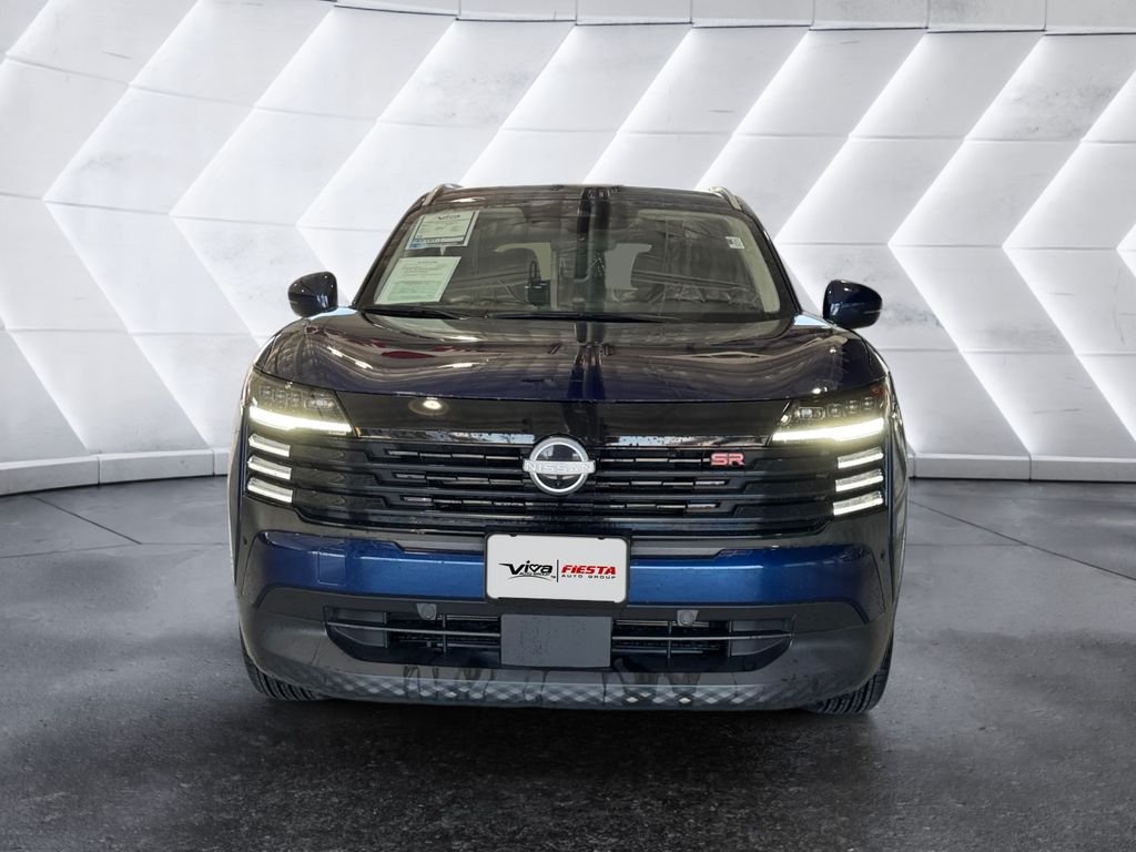 Certified Used 2025 Blue Nissan SR image 2