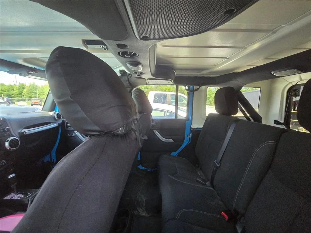 Used 2017 Blue Jeep Unlimited Sahara image 5