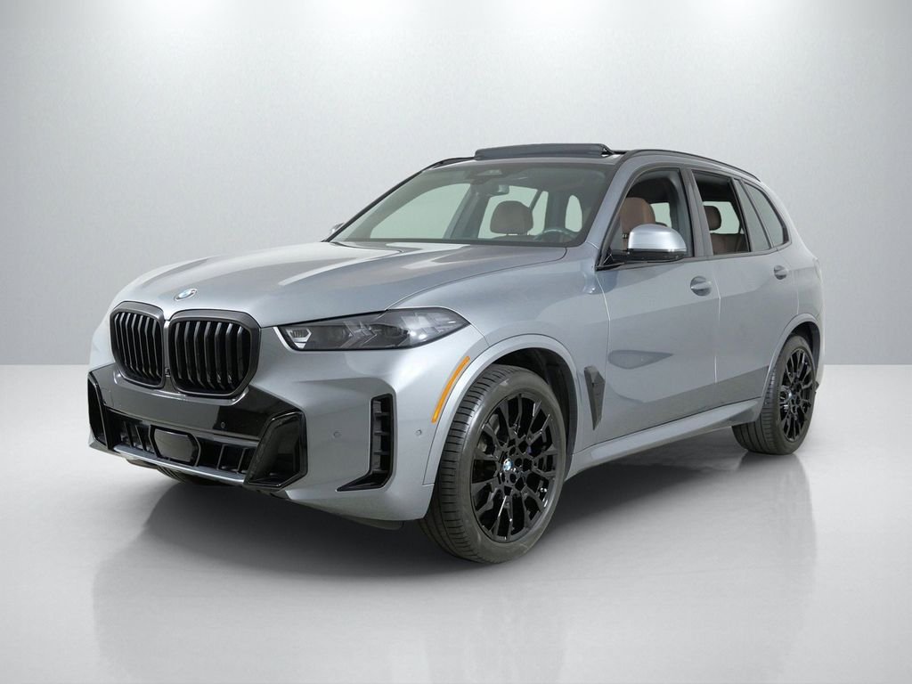 Certified Used 2024 Skyscraper Grey Metallic BMW xDrive40i image 1