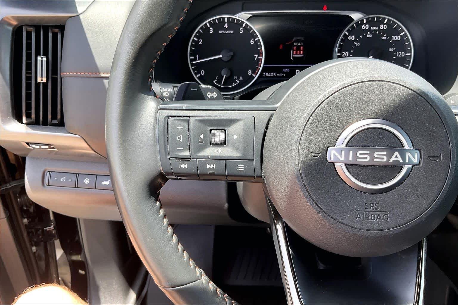Used 2025 Super Black Nissan Rock Creek image 22