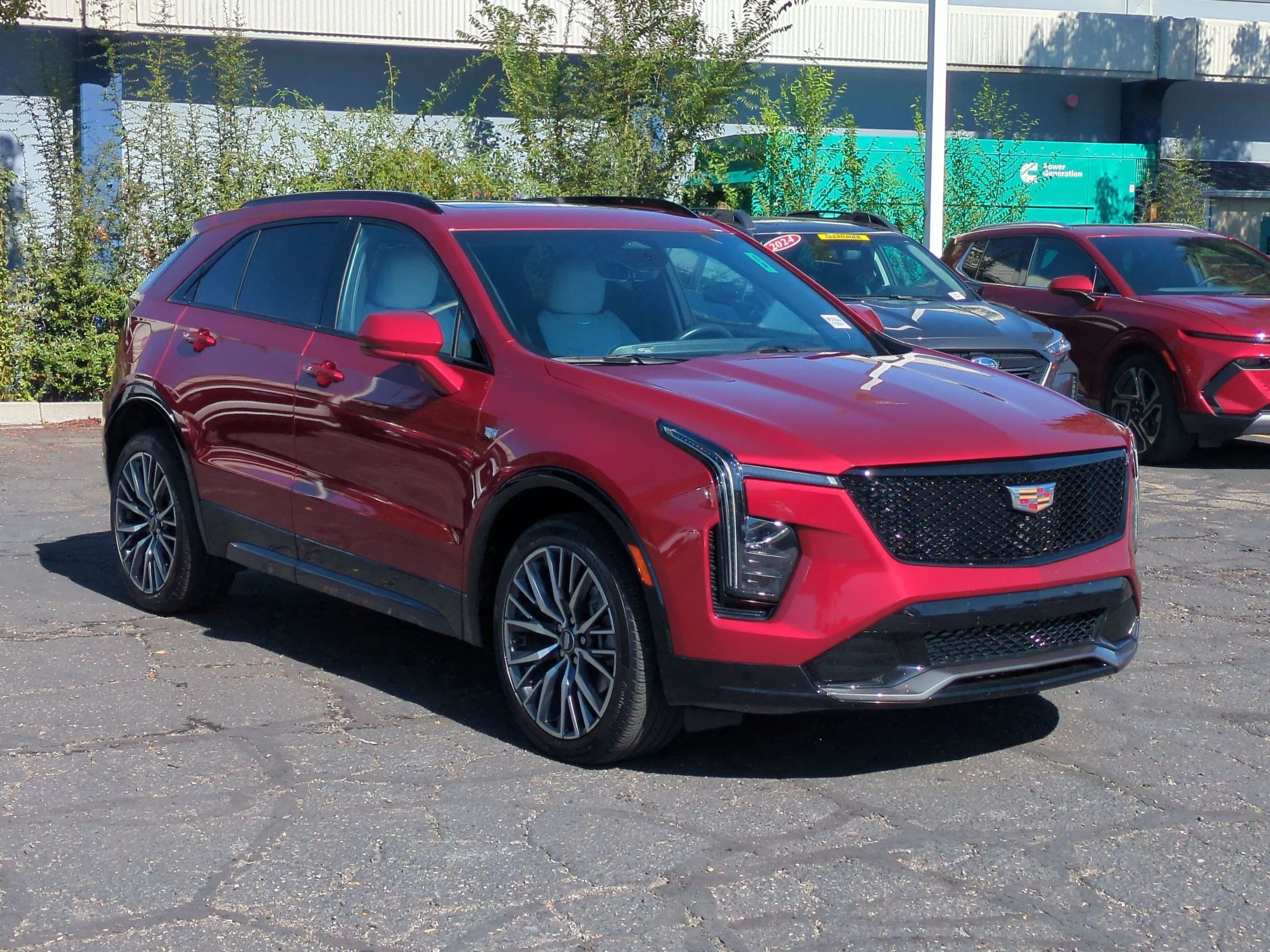 Used 2024 Radiant Red Tintcoat Cadillac AWD Sport image 7